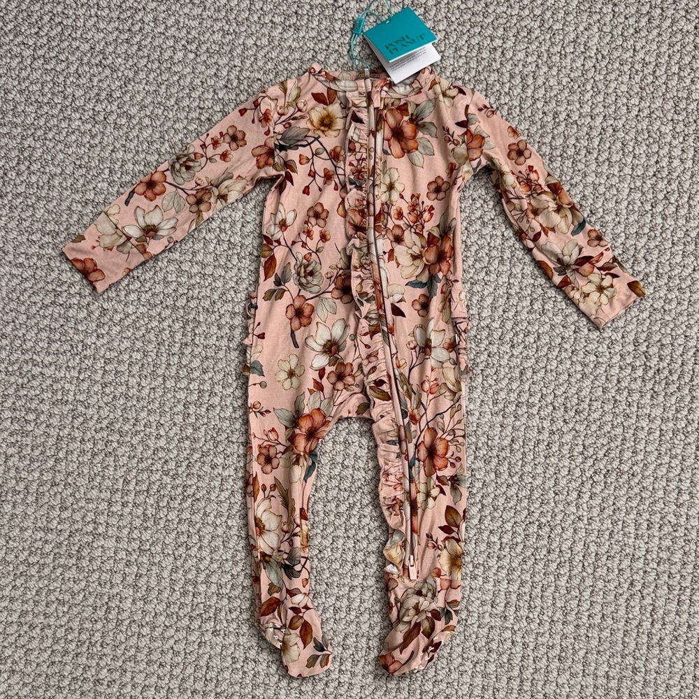 NWT! RETIRED PRINT Posh Peanut “Aura” Ruffle Footed Onesie (Size 6-9 months)